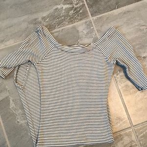 Off the shoulder black and white striped dress.